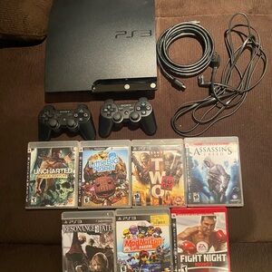 Sony PlayStation 3 Slim Console 160GB witb 7 games & 2 controllers